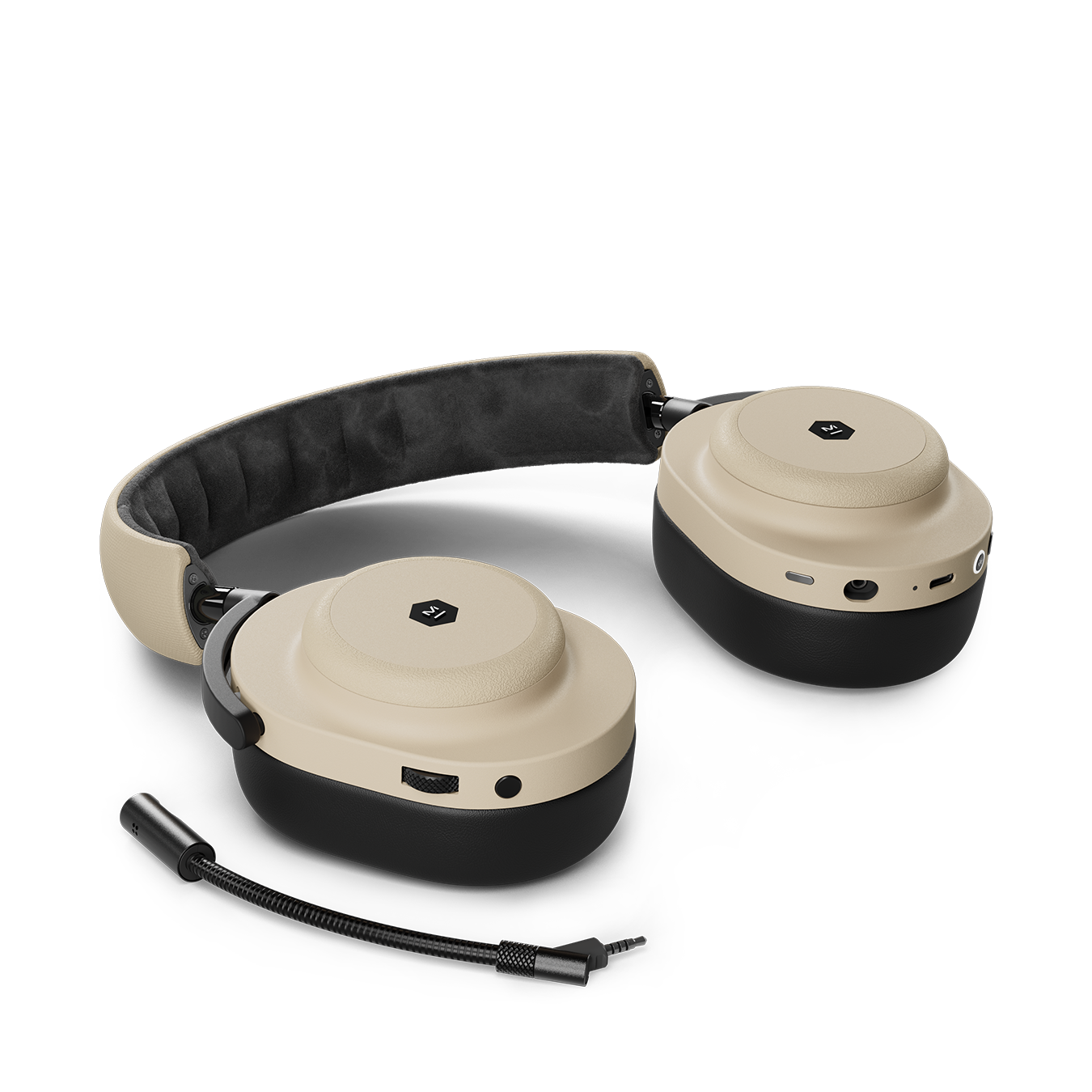 Sand dune and black MG20 Wireless Gaming Headphones laying on a flat surface next to a detachable boom microphone | gallery MG20SD10