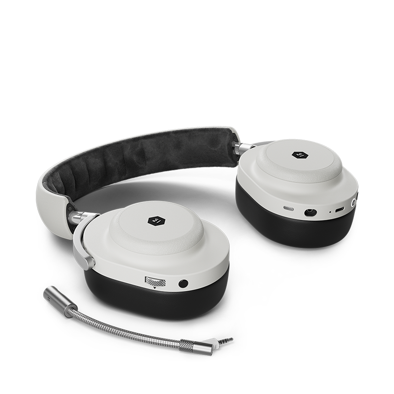 Galactic white MG20 Wireless Gaming Headphones laying on a flat surface next to a detachable boom microphone | gallery MG20S3