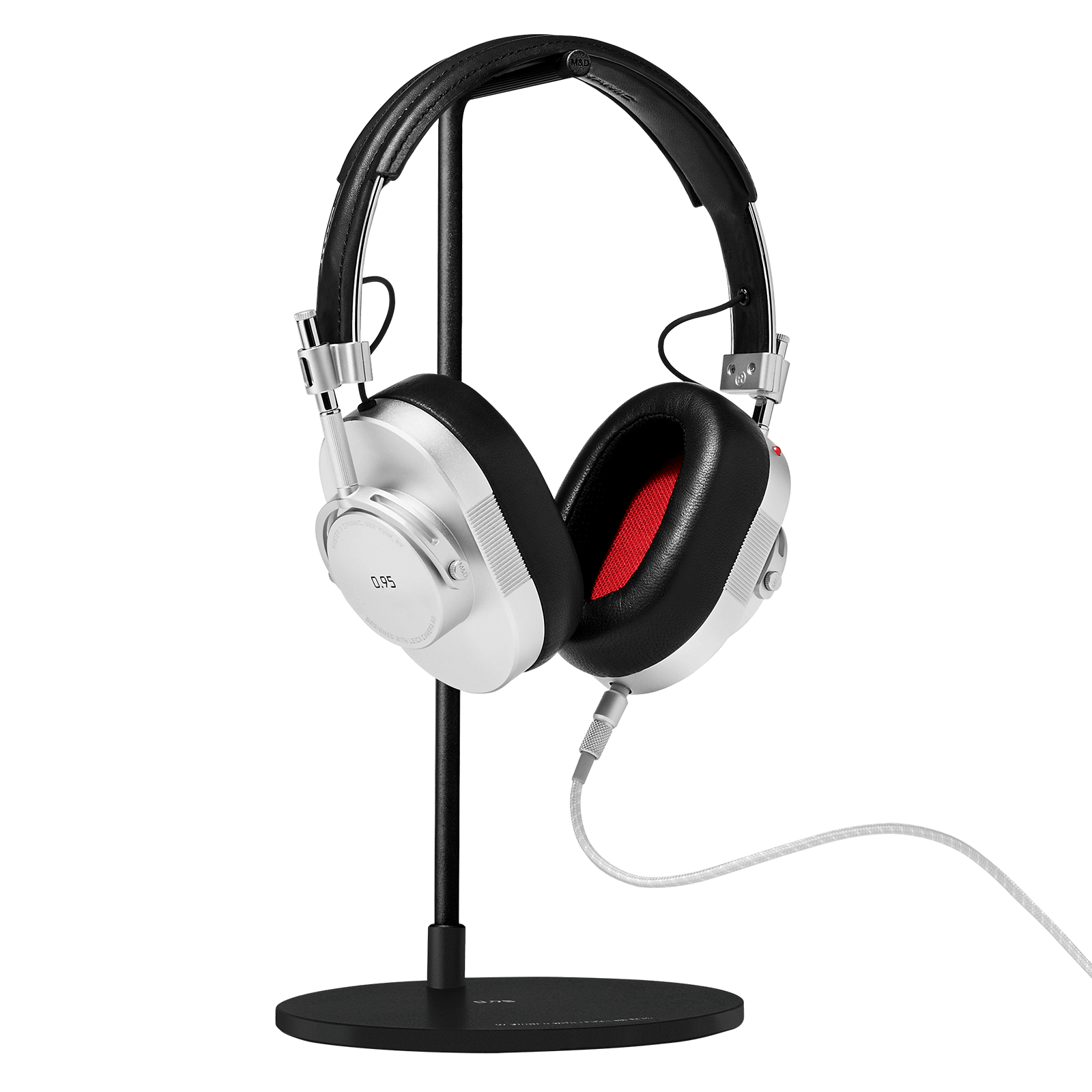 Black leather and silver metal MH40 Wireless headphones with Leica 0.95 logo on the ear cup placed on a black headphone stand with optional 3.5mm audio cable | gallery MH40S-95