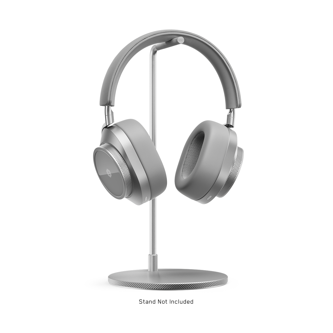 Silver and grey MW75 Active Noise-Cancelling Headphones placed on a silver headphone stand | gallery MW75S3