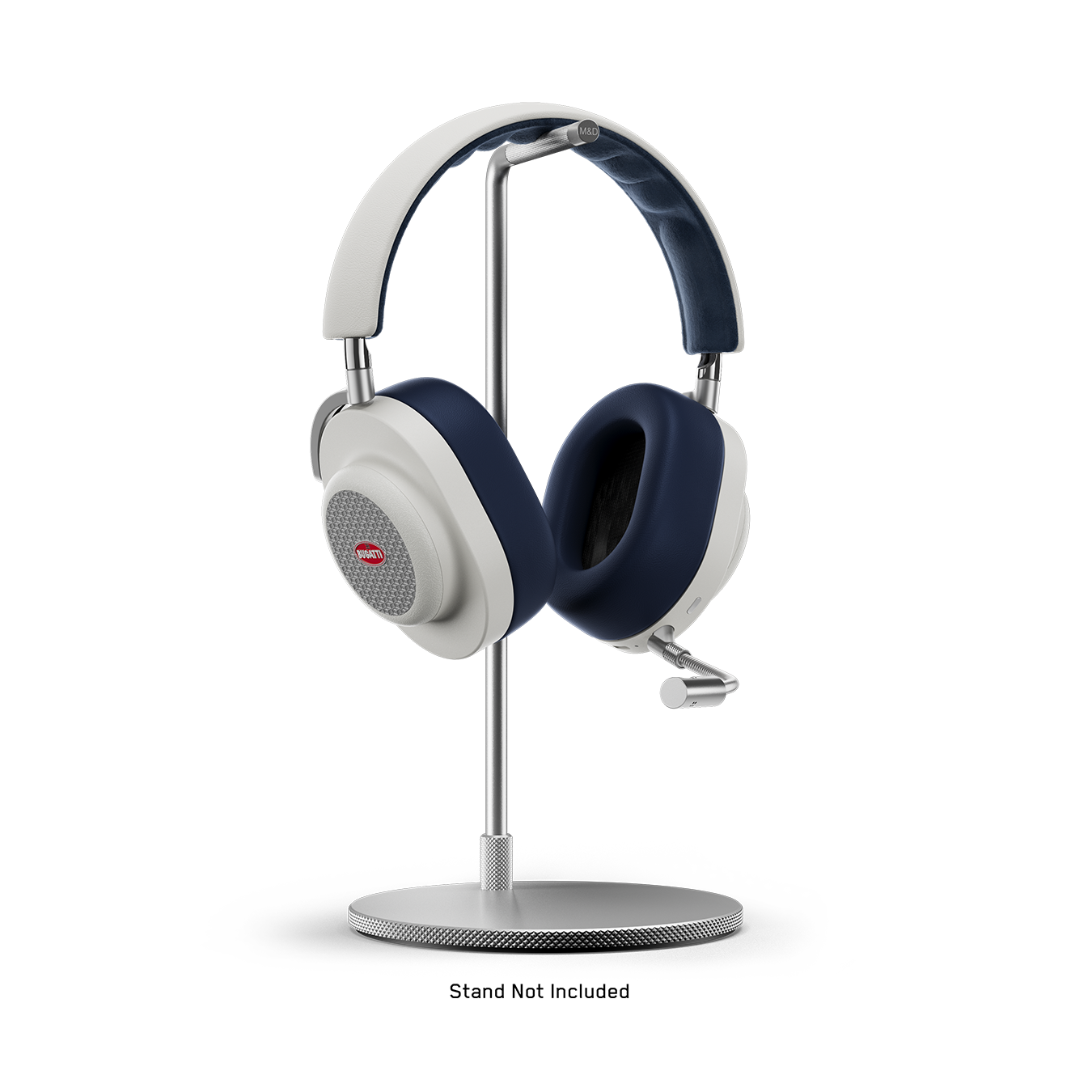 White and navy BUGATTI MG20 Wireless Gaming Headphones with detachable boom microphone placed on a silver headphone stand. | gallery MG20BGT3