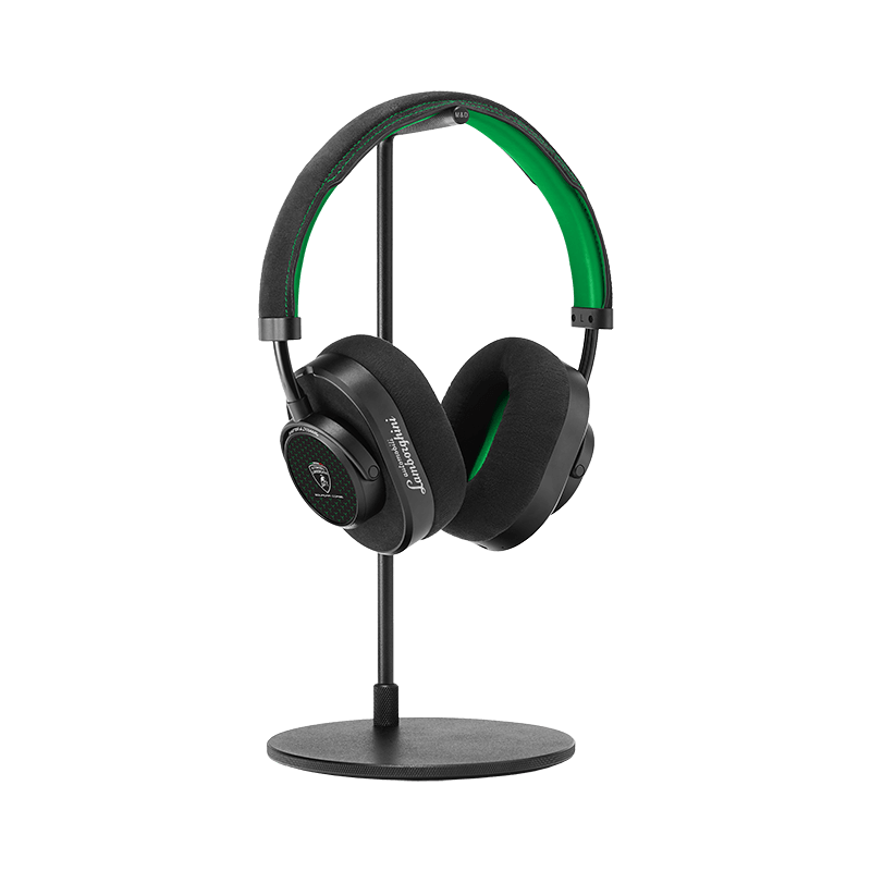 Black leather and metal MW65 Wireless headphones with Automobili Lamborghini on the ear cup placed on a black headphone stand showing inner green Alcantara headband and ear pads | gallery MW65LAM-SC1