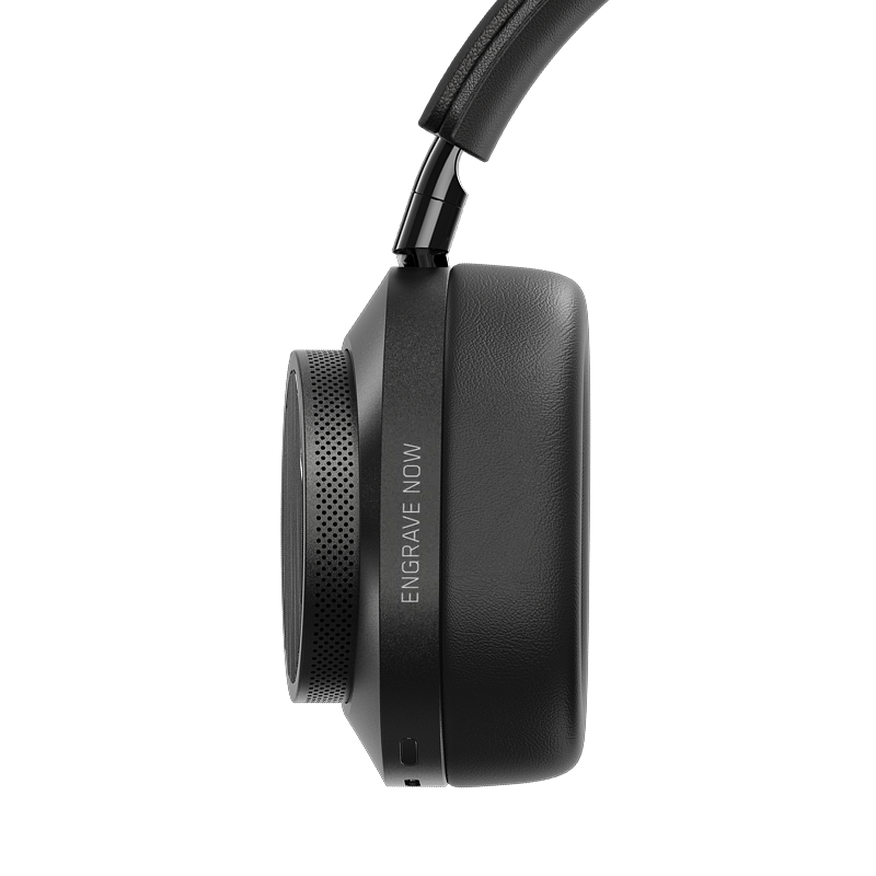 Close-up of black TUMI MW75 Active Noise-Cancelling Headphones showing ear cup and optional engraving | gallery MW75B-TUMI